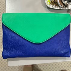 Perfect Condition With Tags Blue Envelope Bag For Daily Use, Chic Blue Everyday Clutch, Blue Envelope Clutch For Everyday Use, Blue Leather Chic Clutch, Blue Chic Leather Clutch, Blue Clutch For Summer, Summer Blue Clutch, Blue Casual Clutch For Everyday Use, Casual Blue Clutch For Everyday Use