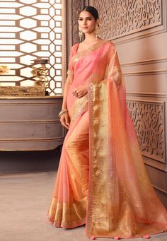 Organza Saree with blouse in Peach colour 1205A Desc: Color : Peach Fabric : Organza Silk Work : Embroidery Wash Care : Dry clean Sleeve Style : Half Sleeve Long Sleeves : Done only in Custom Stitch Sleeves Lining : Done only in Custom Stitch Bust Size : 32 to 42 Inches Occasion : Temple Wear Social Gathering Pongal Gudi Padwa Onam Ugadi. With Express Free Shipping Buy Indian Party wedding wear Bridal Sarees Organza Saree with blouse in Peach colour 1205A online in USA, UK and Canada from KollyB Luxury Peach Saree With Resham Embroidery, Luxury Peach Georgette Saree, Luxury Peach Chanderi Saree, Sarees Online Uk, Luxury Peach Saree Dress, Luxury Festive Peach Saree, Luxury Peach Saree With Pallu Detail, Luxury Semi-stitched Peach Saree, Luxury Peach Saree With Dupatta