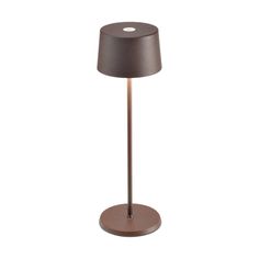 a lamp that is on top of a wooden base with a light bulb in the middle