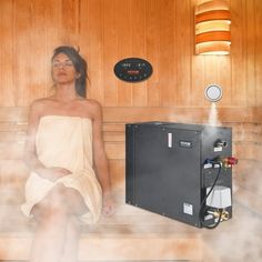 a woman sitting in a sauna with steam coming out of her body and on the side