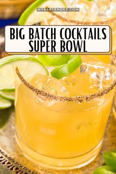 the big batch cocktails super bowl is ready to be served with lime and ginger