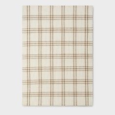 a white and brown plaid fabric