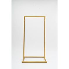 a gold metal frame against a white background