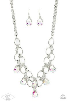 Joined by dainty silver links, two rows of dramatic silver chain layer below the collar in a fierce fashion. Iridescent teardrop gems drip from the glistening layers, adding a timeless shimmer to the show-stopping piece. Features an adjustable clasp closure. Fierce Fashion, Multi Necklace, Diamond Life, Gem Necklace, Fringe Necklace, Jewelry Show, Paparazzi Accessories, Colourful Necklace, Paparazzi Jewelry