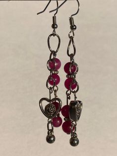 Hand-beaded earrings made with up-cycled beads. Trendy Dangle Earrings With Heart Beads, Trendy Handmade Dangle Heart Earrings, Handmade Trendy Metal Beaded Earrings, Trendy Handmade Metal Beaded Earrings, Earrings Pink, Purple Heart, Heart Love, May 1, Accessories Unique