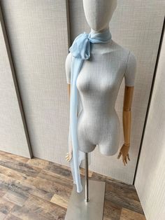 This elegant stylish silk scarf is so fun and versatile. Beautifully hand-made with fine silk chiffon that feels so delicate and soft to the touch. You can also tie the scarf into a bow  around your ponytail or use it as a sash. The length of the scarf in the photos measures 115" long. Shown in powder blue chiffon.  * RETURN POLICY - We do not accept returns for a refund as all of out items are made to order. But please contact us if you are having an issue with your order. - We do accept exchanges. You can exchange your items for something else in our shop. The items you would like to exchange should be shipped back in the original condition within 7 days of the delivery. The buyer is responsible for the cost of postage for the returning items. Elegant Silk Chiffon Scarves For Summer, Elegant Blue Scarves For Wedding, Elegant Blue Scarf For Wedding, Elegant Silk Scarf For Summer Weddings, Chic Silk Scarf For Summer Weddings, Chic Silk Scarf For Wedding In Summer, Elegant Silk Chiffon Scarves For Wedding, Elegant Blue Silk Scarf For Wedding, Elegant Silk Chiffon Scarf For Wedding