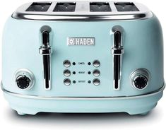 a blue toaster sitting on top of a white table