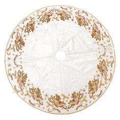 a round white and gold tablecloth with floral designs on it, isolated against a white background