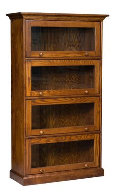 an oak bookcase with three drawers