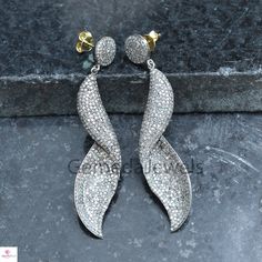 Sale!! Pave Diamond Earrings, Twisted Earrings Jewelry, 14k Gold Earrings, 925 Silver Diamond Earrings, Valentine Gift Jewelry, Gift For her Earrings Details: Gold Weight: 0.35 gm Diamond Weight: 6.75 Cts Gross Weight: 15 Grams Earrings Size: 68X13mm 14 k Yellow Gold Earring NOTE:- All The Products Are Designed And Manufactured In My Workshop By Me & My Team. Shown Products Are Purely Handmade. Custom Orders Are Open Handly Accepted. We Are Perfect Choice For Any Custom Jewelry Manufacturing Sterling Silver Pave Setting Earrings For Anniversary, Sterling Silver Earrings With Pave Setting For Anniversary, Anniversary Sterling Silver Earrings With Pave Setting, Dazzling Bridal Earrings With Pave Setting, Sterling Silver Hand Set Dangle Diamond Earrings, Dazzling Sterling Silver Earrings With Pave Setting, Sterling Silver Pave Bridal Earrings As Gift, White Dangle Earrings With Pave Setting, Sterling Silver Pave Bridal Earrings For Anniversary