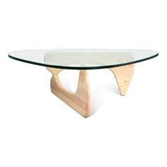 an oval glass table with wooden legs and a wood base, on a white background