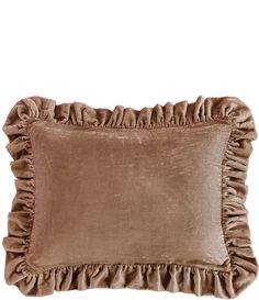 a brown pillow with ruffled edges