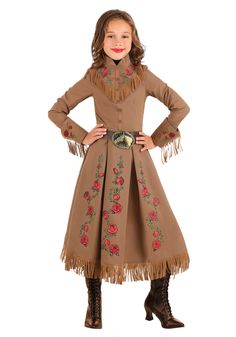 PRICES MAY VARY. Size: Medium COSTUME INCLUDES: This Annie Oakley Costume for kids includes a western dress and a faux leather belt with a metal buckle. FROM FUN COSTUMES: Halloween costumes are what we do and we're always excited to make outfits for the most famous figures of all time. Now your little one can experience the wild west by roleplaying as the legendary historical figure and ace sharpshooter Annie Oakley with this costume! AUTHENTIC DESIGN: We designed this Annie Oakley kids costume Annie Oakley Costume, Wax Museum Project, Western Costume, Pink Cowgirl Boots, Costume For Girls, Annie Oakley, Cowboy Costume, Cowgirl Costume, Calf Length Skirts