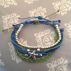 Add a touch of bohemian vibe to your summer look with this handmade Starfish Beachy Beaded Bracelet Pack Set. Perfect for women who love the beach and sea life, this adjustable bracelet stack is made with high-quality waxed string and features charming beads that add a unique touch to your outfit. The bracelet stack exudes a laid-back and adventurous style, making it suitable for those who love the outdoors and exploring the world. With its bohemian and beachy theme, this bracelet pack set is a Cheap Handmade Starfish Bracelets, Cheap Summer Charm Bracelet For Beach, Beachy Boho Jewelry, Bohemian Blue Friendship Bracelets For Summer, Blue Bohemian Friendship Bracelets For Summer, Turquoise Bohemian Strand Friendship Bracelets, Turquoise Bohemian Wrap Bracelet For Beach, Bohemian Strand Friendship Bracelets, Bohemian Friendship Bracelets For Beach Season