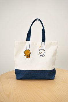 Milk Mocha Bear - Hanging Out Canvas Tote Bag [16x12.5 Inches 8 Inches Tall] NEW ITEM DESCRIPTION SHOPVILLE Commitment FAST FREE Shipping SAFE & SECURE Payments 30 DAY Return Policy VISIT Our Store The Shopville Commitment 100% Customer Satisfaction Buy from us with confidence. With years of experience and thousands of orders fulfilled, we maintain our commitment to deliver top service. Our reputation for service should speak for itself. Rest assured, we are committed to 100% customer satisfacti Cute Brown Bags For Daily Use, Cute Brown Bag For Daily Use, Cute Canvas Shoulder Bag For Daily Use, Cute Beige Canvas Bag For Everyday Use, Casual Travel Bag With Bear Design, Cute Canvas Pouch Bag For Daily Use, Cute Bags With Animal Design For Everyday Use, Beige Bags With Animal Design For Everyday Use, Cute Everyday Pouch Canvas Bag