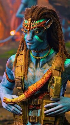 a man with dreadlocks and makeup is dressed as avatar from the movie avatar