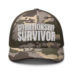 White embroidered olive camo trucker hat with 100% cotton front and mesh back. One size fits most. Camouflage Trucker Baseball Cap, Khaki Trucker Snapback Hat, Adjustable Camouflage Trucker Snapback Hat, Camouflage Trucker Hat With Curved Bill, Camouflage Trucker Snapback Hat With Curved Bill, Camouflage Curved Bill Trucker Snapback Hat, Military Style Trucker Hat, One Size Fits Most, Military Style Trucker Hat One Size Fits Most, Khaki Snapback Trucker Hat For Streetwear