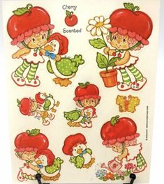 the stickers have strawberrys on them and flowers in their hair, as well as other