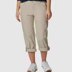 Columbia Woodland Hills Ladies' Roll Up Pant Features: Omni-Shade Upf 30 Sun Protection Cargo Pockets Features: Colors: Water Resistant Material Drawcord For Adjusting Waist Zip-Closed Security Pockets Made In Vietnam Content: Shell And Lining: 100% Nylon Insulation: 100% Polyester Approximately 105 Gsm Lightweight Sizing: Sizes: Xs - Xxl Size Conversion: Xs = 0-2 | S = 4-6 | M = 8-10 | L = 12-14 | Xl = 14-16 | Xxl = 16-18 Waist Width At Top (In): Xs = 28.5 | S = 30.5 | M = 33 | L = 36 | Xl = 39 Outdoor Spring Capri Length Bottoms, Spring Outdoor Capri Length Bottoms, Spring Outdoor Bottoms With Straight Leg, Spring Straight Leg Outdoor Bottoms, Spring Outdoor Straight Leg Bottoms, Spring Straight Leg Bottoms For Outdoor, Columbia Pants, Woodland Hills, 5 S