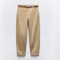 New With Tags. Zara Chino Pants. Mid Waist With Braided Belt. Front Pockets And False Back Double Welt Pockets. Cuffed. Front Zip And Button Closure. Size 27 (Us 4) Mid-Camel Color. Beige Straight Chinos With Belt Loops, Beige Straight Leg Chino Pants, Beige Chino Cotton Twill Straight Pants, Chino Cotton Twill Pants With Belt Loops, Straight Leg, Beige High-waisted Chinos With Pockets, Tan Chinos, Braided Belt, Zara Pants, Chino Pants