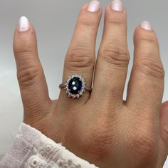 "**Celebrate Love and Family with Our Sapphire Blue Engagement Ring!  💍 **Symbol of Love This elegant sapphire blue engagement ring is not just a piece of jewelry; it's a symbol of your love and commitment. Perfect for engagements, anniversaries, and celebrating your Christmas Gift. 🌟 **Timeless Elegance Featuring an exquisite oval-cut sapphire blue stone, this ring exudes timeless beauty and sophistication. Crafted with care in 925 sterling silver, it's a lasting reminder of your special moments. 🎁 **Perfect Christmas Gift for Mom Looking for a meaningful Christmas gift for your mom? This beautiful ring makes a thoughtful and cherished present that shows your love and appreciation. ⭐ **Why Choose Our Sapphire Blue Engagement Ring - **Symbolizes Love and Commitment Perfect for engagemen Sapphire Oval Halo Ring For Anniversary, Oval Sapphire Halo Ring For Anniversary, Elegant Birthstone Halo Ring For Anniversary, Sapphire Sterling Silver Jewelry For Anniversary, Elegant Anniversary Halo Ring With Birthstone, Oval Blue Birthstone Ring For Anniversary, Blue Oval Birthstone Ring For Anniversary, Oval Diamond Ring For Anniversary, Anniversary White Gold Halo Ring With Birthstone