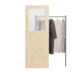 an open wooden door with clothes hanging on the hangers next to it and a white background