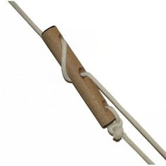 a wooden handle with white rope attached to it