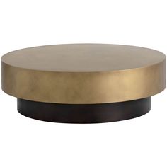 a round brass and black coffee table