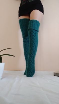 Cozy Thigh High Knitted Socks, Fitted Footless Winter Stockings, Fitted Thigh High Knitted Legwear, Tight Footless Winter Stockings, Fitted Thigh-high Knitted Legwear, Soft Thigh High Stockings For Winter, Fitted Knitted Knee-high Legwear, Fitted Green Thigh High Legwear, Fitted Over The Knee Winter Stockings