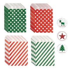 four boxes with different designs on them, one is green and the other is red