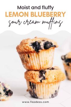 blueberry muffins stacked on top of each other with the words, most and fluffy lemon blueberry sour cream muffins