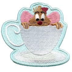 a cartoon character in a teacup with its arms out and eyes wide open, on a white background