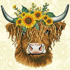 a cow with sunflowers on it's head is shown in this cross stitch pattern