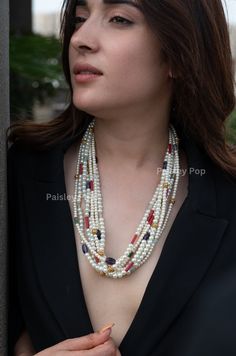 The Multicolored Cultured Pearls Necklace is flawlessly handcrafted by artisans to celebrate the beauty of the land of colors with the heritage of rich old Indian Jewelry. The handcrafted necklace plated with 22K gold has colorful semi-precious stones to give you color therapy. Inspired by Sabyasachi jewelry, add a punch of colors to your style and wear a rainbow around your neck. Closure - Lobster Style Tip - When it comes to getting a classic look, nothing can beat pearls. The layered pearl necklace is fit for a woman who is fiercely independent yet rooted in traditional and cultural heritage, carving her own style with classic and timeless fashion choices that can be repurposed for years to come. Handcrafted in Jammu and Kashmir. Paisley Pop travels the depths of India to learn techniqu Elegant Multicolor Double Strand Necklace, Handmade Multicolor Beaded Temple Jewelry Necklace, Handmade Multicolor Temple Jewelry Necklaces, Elegant Multicolor Single Strand Beaded Necklace, Elegant Multicolor Beaded Necklaces For Festive Occasions, Multicolor Round Beads Pearl Necklace For Celebration, Multicolor Gemstone Beads Necklace For Celebration, Multicolor Fusion Necklace With Gemstone Beads, Elegant Multicolor Necklaces For Celebration