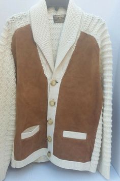 MENS SWEATER CARDIGAN / JACKET CREAM and BROWN SUEDE with FABULOUS BUTTONS  by TUNDRA CANADA SIZE M (READ MEASUREMENTS) DESCRIPTION: PRE OWNED LOOKS EXCELLENT LIKE NEW CREAM/IVORY KNIT  PURE VIRGIN WOOL with BROWN SUEDE PATCHES ON ELBOWS & FRONT MADE in CANADA by TUNDRA KNIT SWEATER EVEN 2 POCKETS AMAZING AMAZING BIG BUTTONS SIZE M LOOK AT PICTURES - FROM ALL SIDES - MIGHT BE GLARE FROM outdoor - MEASUREMENTS FLAT APPROX: (MATERIAL STRETCHES) ARMPIT to ARMPIT about 21" FROM UNDER ARM TO END OF C Vintage Shawl Collar Outerwear For Fall, Retro Cream Outerwear For Fall, Retro White Outerwear For Fall, Retro White Fall Outerwear, Vintage Shawl Collar Winter Outerwear, Vintage Winter Outerwear With Shawl Collar, Classic White Shawl Collar Outerwear, Vintage Brown Cardigan With Pockets, Classic White Outerwear With Shawl Collar