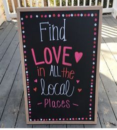 a sign on the porch that says find love in all the local places with hearts