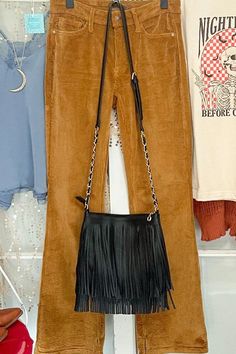 Faux LeatherZip Top ClosureAdjustable Shoulder Strap9.75(L) X 6.75(H) X 1(W) Fall Faux Leather Shoulder Bag With Adjustable Strap, Chic Fringe Bags For Fall, Soft Leather Shoulder Bag For Fall, Chic Fall Bags For Night Out, Trendy Faux Leather Shoulder Bag For Fall, Fall Faux Leather Shoulder Bag With Removable Pouch, Leather Shoulder Bag With Zipper For Night Out, Trendy Fringe Bags For Fall, Trendy Fall Bags With Fringe