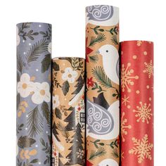 four rolls of wrapping paper are lined up in different patterns and colors, each with a bird on it