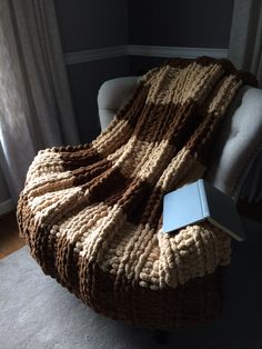 a couch with a blanket on top of it