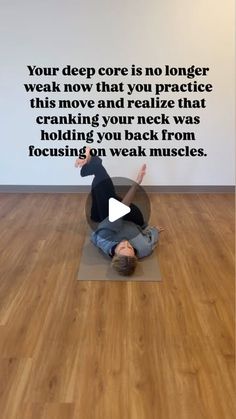 a man sitting on top of a yoga mat in front of a wall with an inspirational quote