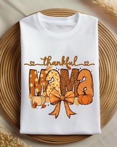 Thanksgiving Mama Shirt, Thankful Shirt, One Thankful Mama, Fall Shirt, Autumn Shirt, Pumpkin Shirt, Fall Season, Gift for Mama, Fall Lover *Shirt Info* 100% Cotton for solid colors, heather colors and sport grey include polyester Gildan 64000 Unisex Soft Style T-Shirt  6 color options (Navy, Sand, Black, Maroon, Sport Grey, or White) *Care Instructions* Machine wash cold (max 30C or 90F) Turn shirt inside out Tumble dry on low heat  Do not iron Do not dry clean *Sizing* Please refer to the size Mama Thanksgiving Shirt, Thankful Mama, Thankful Shirt, Mama Shirts, Pumpkin Shirt, Fall Shirt, Thanksgiving Shirts, Mama Shirt, Fall Shirts