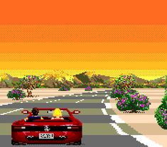 a red car driving down a road next to trees and bushes in front of an orange sky