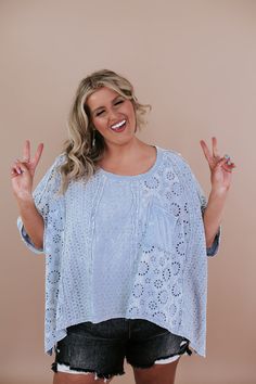 Step into spring with style this fun and flowy eyelet top is sure to make you stand out this season! The Oversized Eyelet Shirt has a mineral-washed finish and playful eyelet details throughout, this top is perfect for embracing the spring vibes. Plus, the oversized fit ensures extra comfort and style all season long! Eyelet cutout detail Oversized Mixed fabric High-low hem. Functional front pocket Fabric: 100% Cotton Fit: Oversized fit you 100% can size down in this! Model Specs: Syd is wearing Bohemian Eyelet Top For Spring, Spring Bohemian Eyelet Top, Oversized Light Wash Tops For Spring, Summer Washed Blouse With Relaxed Fit, Summer Blouse With Washed Relaxed Fit, Casual Cotton Eyelet Top, Casual Cotton Top With Eyelet Details, Oversized Washed Blue Summer Tops, Relaxed Fit Washed Blouse For Summer