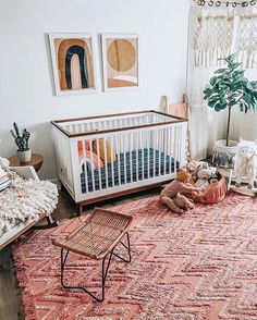 a baby's room with a crib and toys