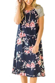 Navy Blue Floral Print A-line Loose T-shirt Dress Flowy Casual Cotton Floral Dress, Casual Blue Floral Dress With Short Sleeves, Blue Casual Cotton Floral Dress, Casual Cotton Floral Knee-length Dress, Casual Flowy Floral Dress, Casual Cotton Knee-length Floral Dress, Casual Knee-length Cotton Floral Dress, Blue Casual T-shirt Dress For Spring, Casual Blue T-shirt Dress For Spring