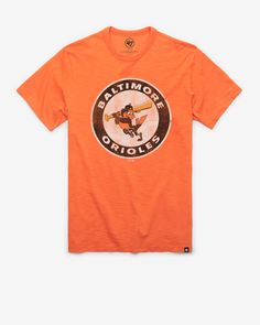 an orange baltimore orioles t - shirt on a white background