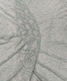 Pure Chikankari saree with very heavy and intricate murri  embroidery, embellished with handwork allover. Pallu and body fully embroidered. The color of the actual product may slightly differ from the pictures. It comes with an unstitched blouse, if you want the blouse stitched please contact me, the blouse can be stitched with an additional cost. Hand embroidered items may have some loose threads. Fabric: Pure Chikankari Work: Chikankari Wash: Hand Wash/Dry Clean Product color may slightly vary due to photographic lighting sources or your monitor settings. NOTE: All our items are handmade and specially customized for our beautiful customers. Please expect minor variations in the actual product as compared to the image displayed. Product color may slightly vary due to photographic lighting Traditional Wear With Chikankari Embroidery For Navratri Reception, Chikankari Embroidered Dola Silk Sharara For Reception, Traditional Wear With Chikankari Embroidery For Diwali Reception, Traditional Wear For Reception With Chikankari Embroidery - Diwali, Navratri Reception Traditional Wear With Chikankari Embroidery, Traditional Wear With Chikankari Embroidery For Reception During Diwali, Diwali Reception Unstitched Suit With Cutdana, Chikankari Embroidery Salwar Kameez For Navratri Reception, Navratri Salwar Kameez With Chikankari Embroidery For Reception