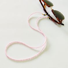 Pink beaded glasses chain, Sunglasses pink cord, Eyewear holder, Sunglasses necklace, Pink glasses holder, Sunglasses strap, Eyeglasses cord Beautiful fashion trend sunglasses beaded string This sunglass strap is lightweight, comfortable to wear and secures your sunglasses on your neck. Fashion trend accessory for the summer! Total length is 70cm / 27.7 inches. Beautifully packaged and ready for gift giving. JEWELRY CARE: Please take care of your jewelry do not wear in the shower, swimming pool, Handmade Adjustable Pink Glasses Chains, Adjustable Pink Beaded Glasses Chain, Adjustable Pink Glasses Chains As Gift, Trendy Adjustable Pink Beaded Necklaces, Trendy Pink Adjustable Beaded Necklaces, Trendy Pink Adjustable Beaded Necklace, Adjustable Pink Glass Glasses Chains, Handmade Pink Glasses Chains For Summer, Adjustable Pink Necklaces For Fashion Accessory