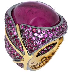 Pink Tourmaline 23.33 Carat Ruby Pink Sapphire 18 Karat Yellow Gold Ring Absolutely spactacular Pink oval Cabochon shape Tourmaline weighing 23.33 Carat in our Ring from "New Age" Collection. It surrounded by 18 Karat Yellow Gold and mix of 78 Ruby weighing 1.79 Carat and 183 Pink Sapphires weighing 4.37 Carat inspires thoughts about something mystic. In brightness it reminiscent of Art Deco style, but according to the smoothness of lines, it is rather Art Nouveau style. Therefore, you can wear Purple Chalcedony, Gold Flower Ring, Contemporary Ring, Black Sapphire, Expensive Jewelry, Estilo Art Deco, Yellow Gold Earring, Yellow Gold Ring, Favorite Rings