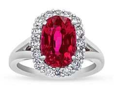 A dazzling 5.12-carat ruby centers this stunning ring. Certified by the American Gemological Laboratories as Mozambique in origin, the radiant red gem sparkles with unparalleled luster. The beautiful ruby is surrounded by a halo of white diamonds totaling approximately 0.76 carat. Set in platinum. Download the Certification Luxury Polished Lab-created Ruby Ring, Fantasy Rings Magic, Fantasy Rings, Unique Pearl Necklace, Fantasy Ring, Rare Diamond, Golden Rings, Radiant Red, Unique Diamond Engagement Rings